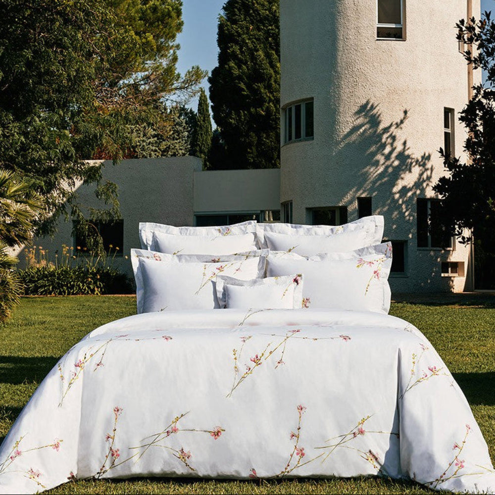 Bed with duvet cover and shams